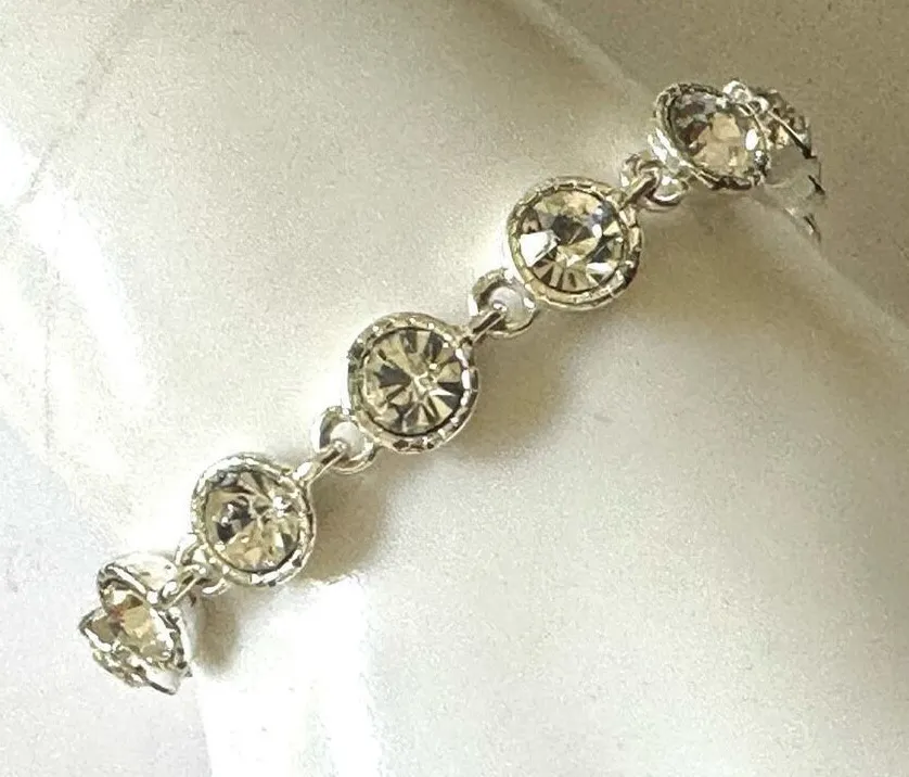 Avon rhinestone silver tone bracelet