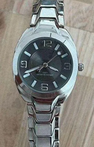 Stainless Ladies Watch Black Dial Stainless Luminous Hands Markers