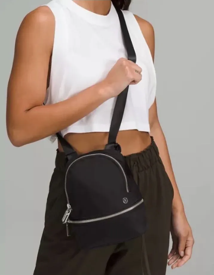 Lululemon City Adventurer Backpack Micro 3L in Black with Gold hardware.