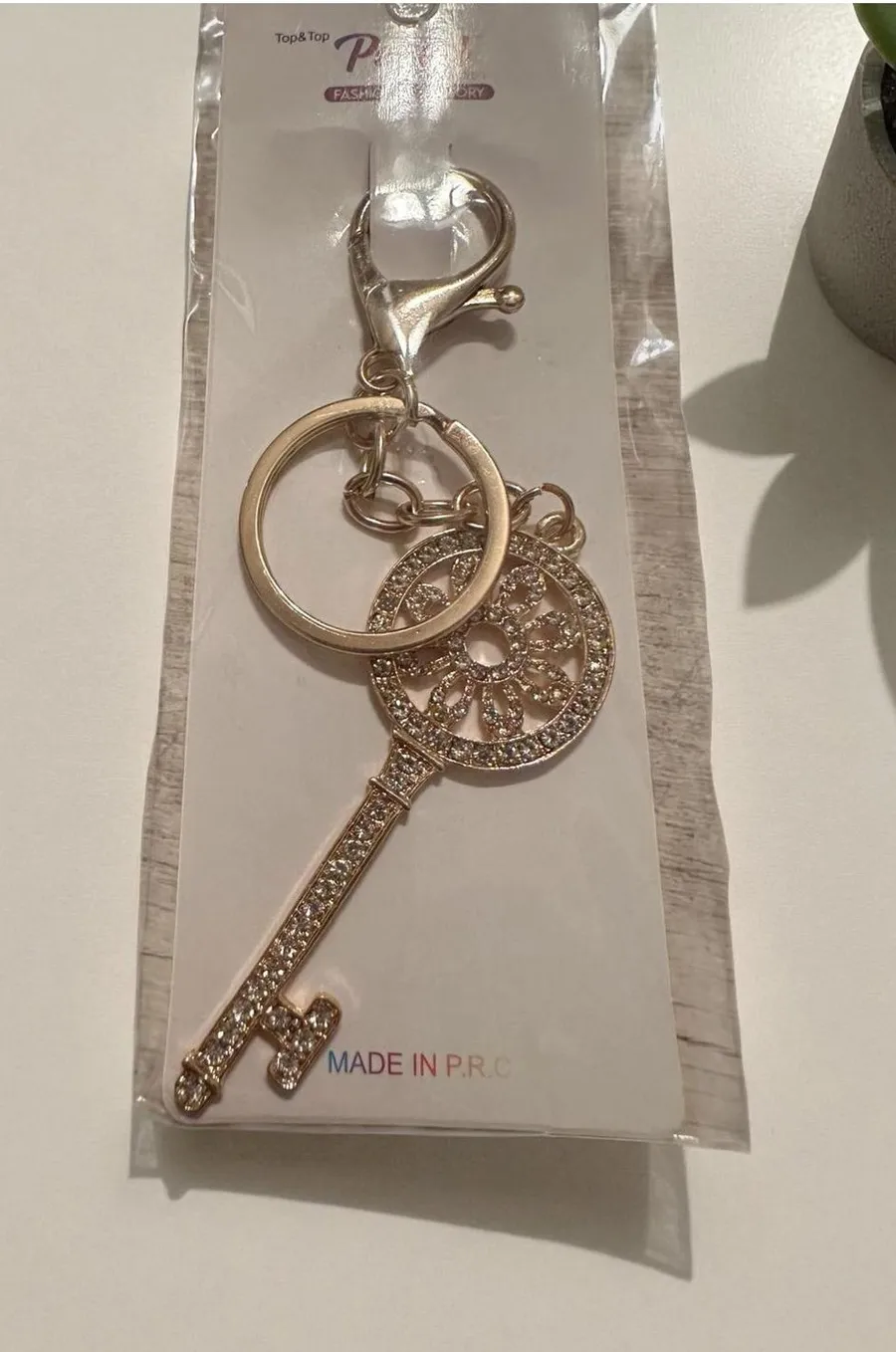 Goldtone Key Shaped Keychain with Rhinestone Detailing Gold