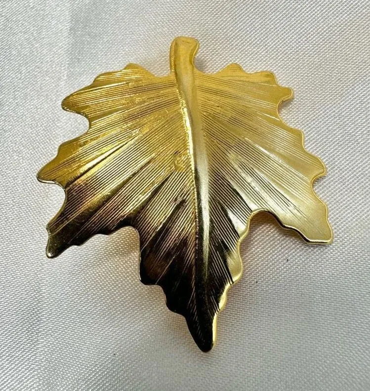 Gold tone leaf pin