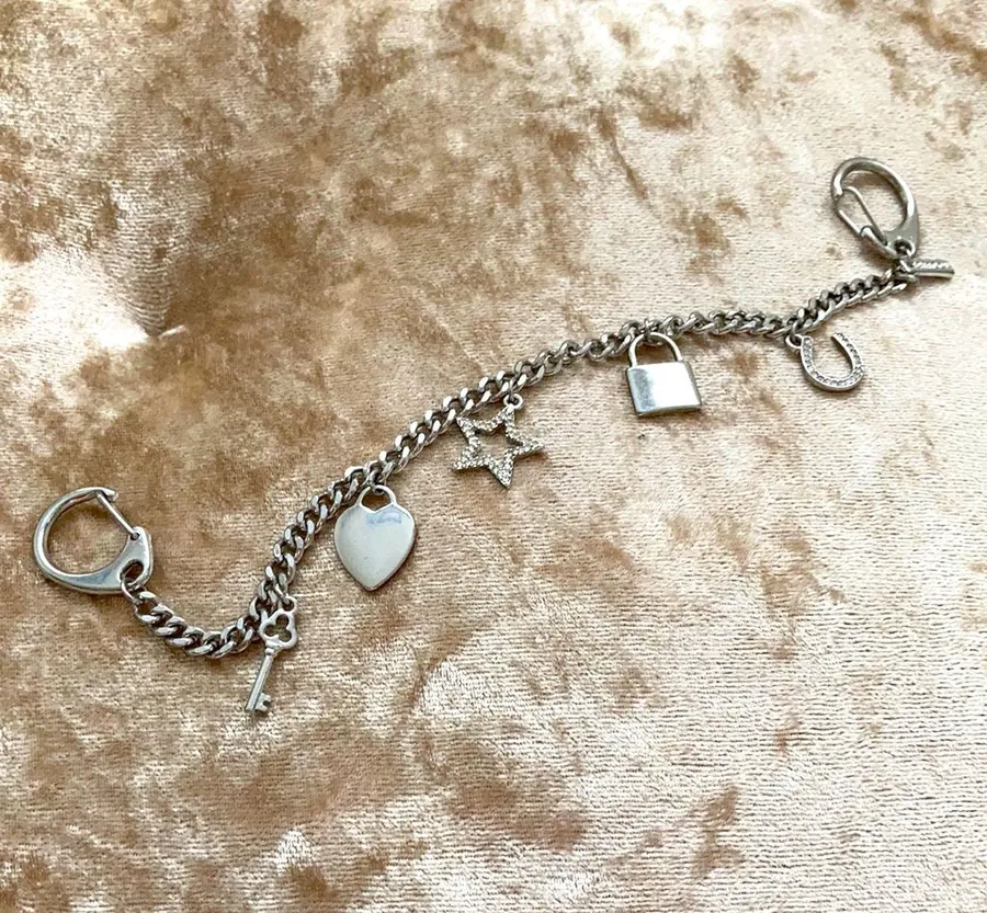 Freedom brand purse/key/belt/wallet charm accessory.