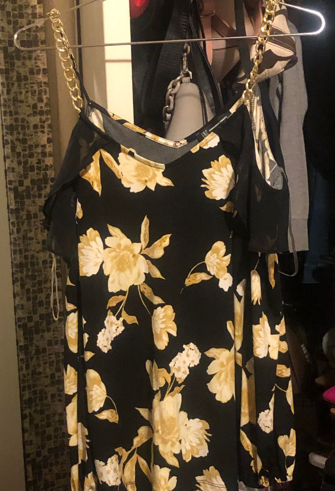 black blouse with yellow flowers