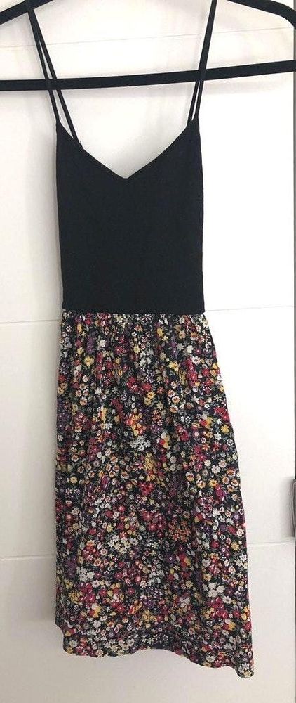 tight top flowy bottom dress