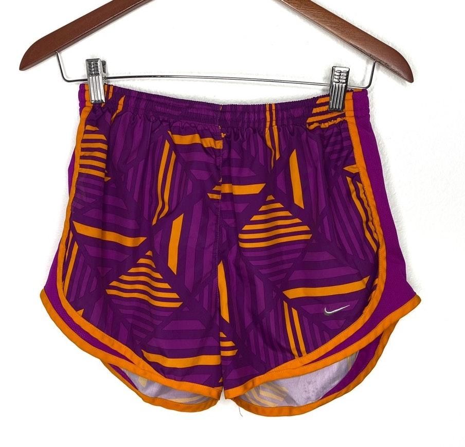 purple and orange nike shorts