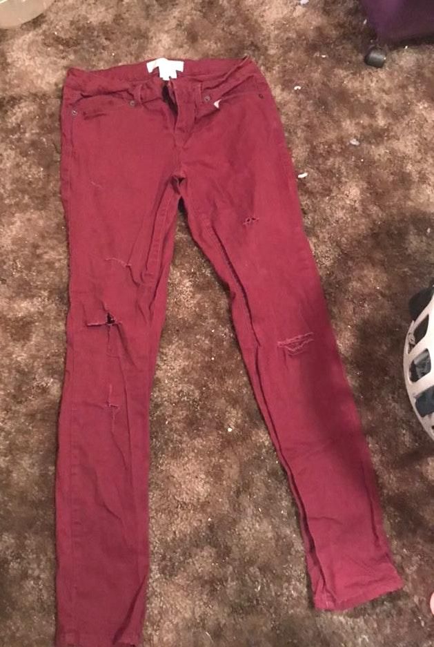 dark red ripped jeans