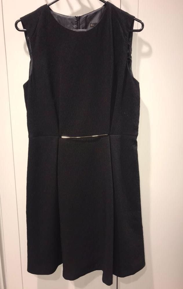 black dress with gold belt