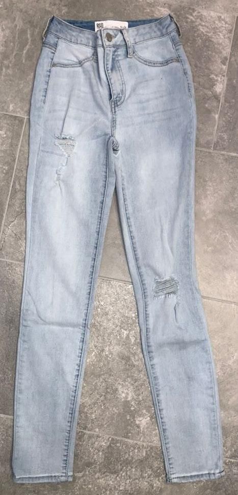 light colored ripped skinny jeans