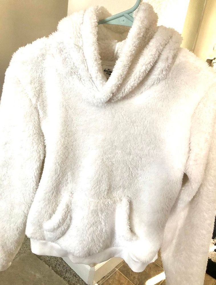 white fuzzy sweatshirt