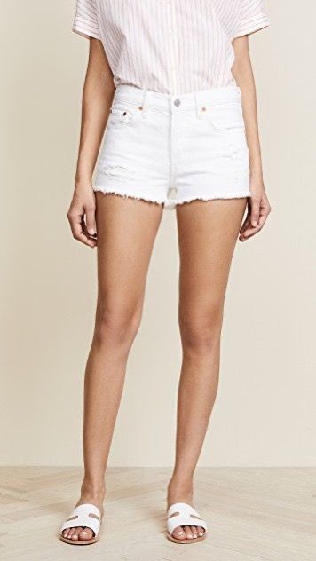 white levi shorts