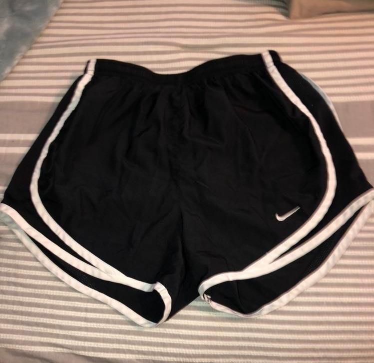 black nike shorts with white trim