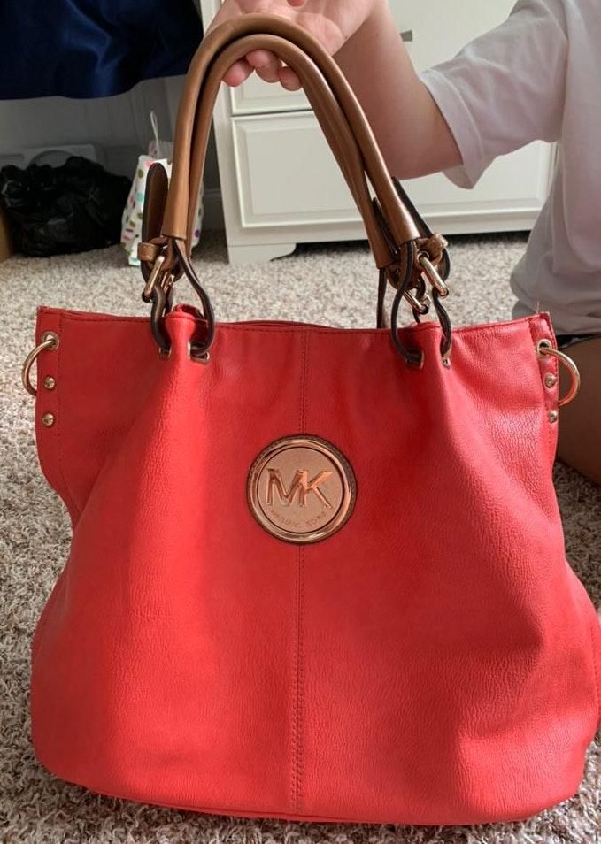 coral michael kors purse