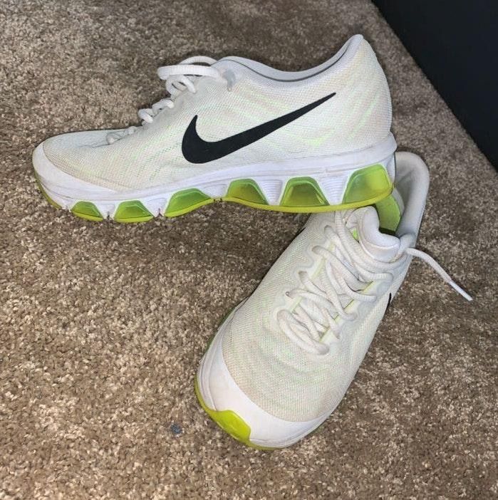 neon green and white nike shoes