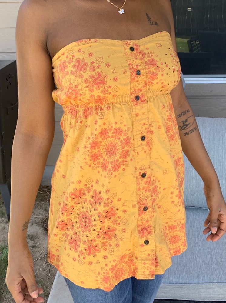 yellow strapless shirt