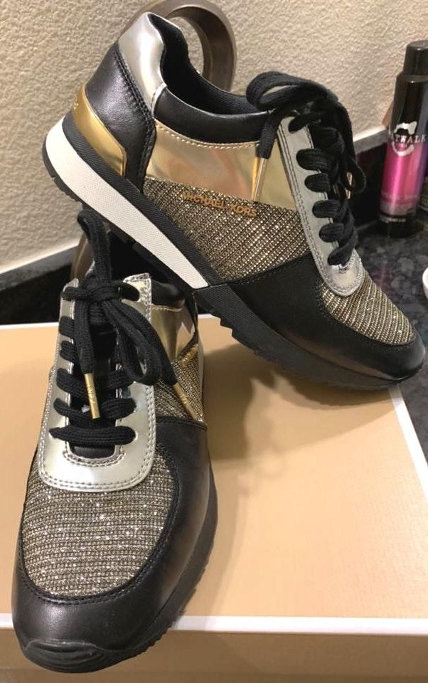 michael kors black and gold tennis shoes