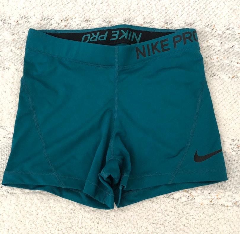 teal nike pros