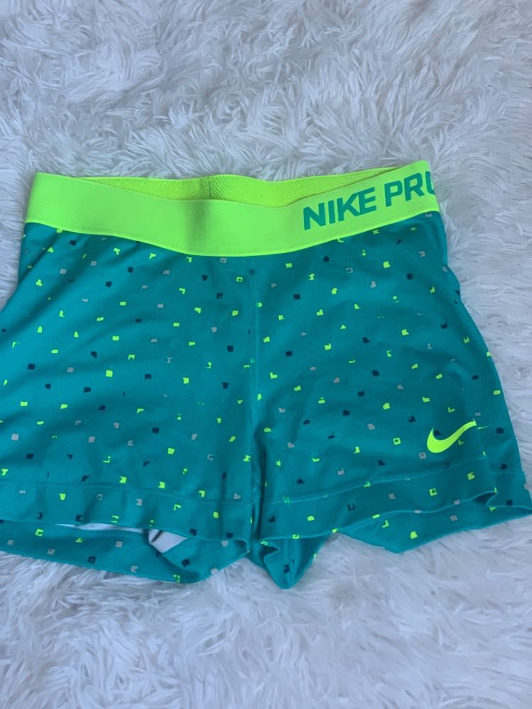 teal nike pros