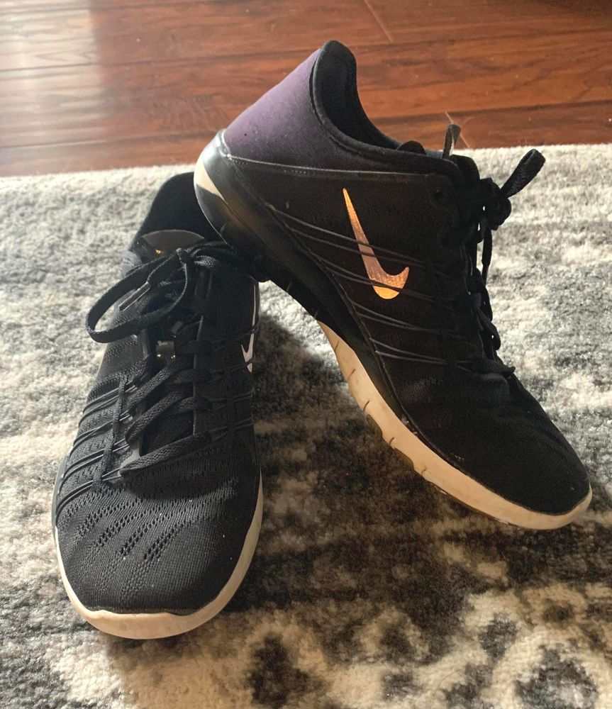 rose gold and black nike trainers