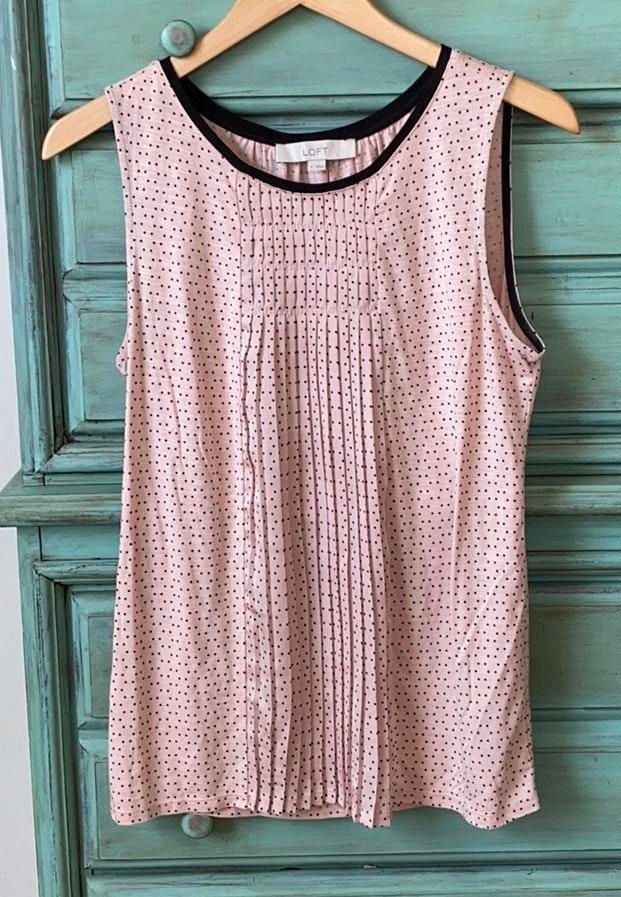 pink and black polka dot blouse