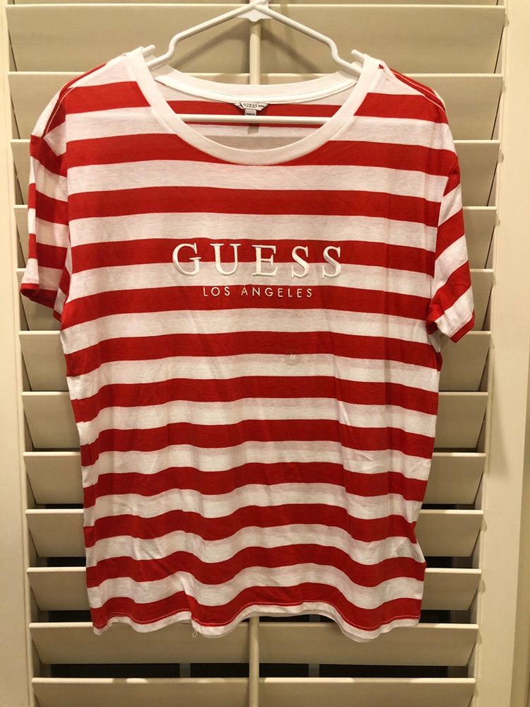 red and white guess t shirt