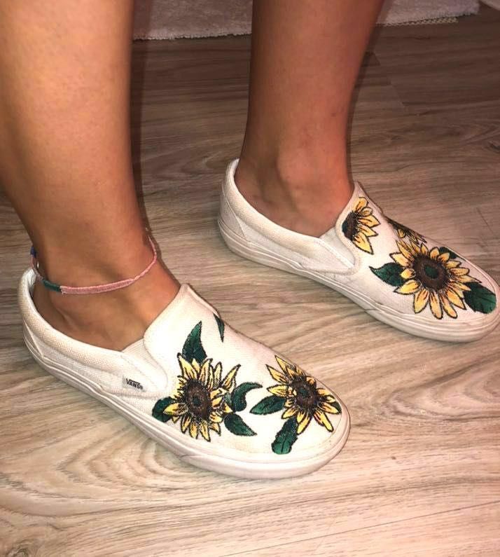white vans with sunflowers