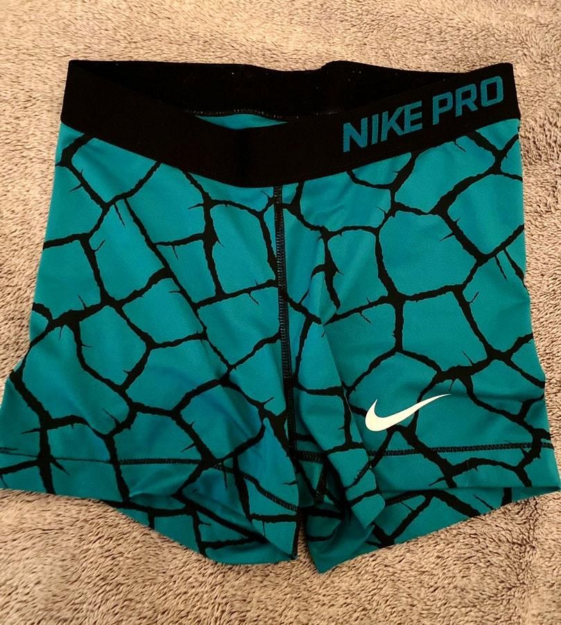 teal nike pros