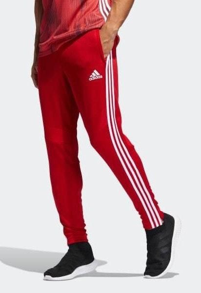 white adidas track pants with red stripes
