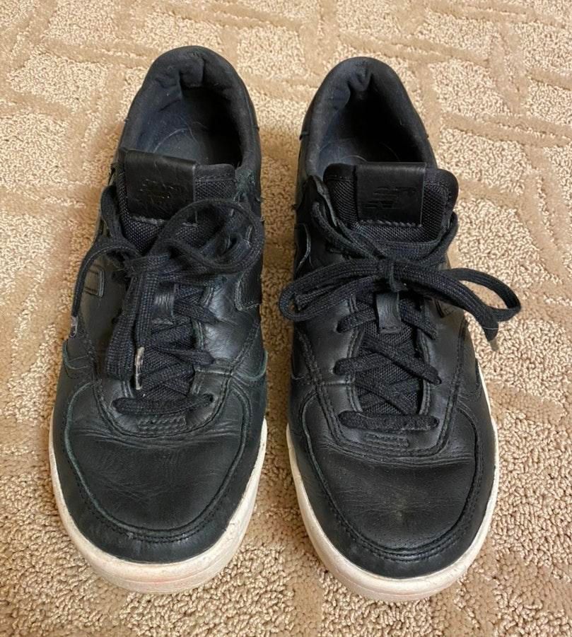 new balance black leather tennis shoes