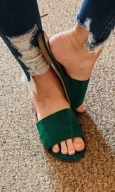 green slip on sandals