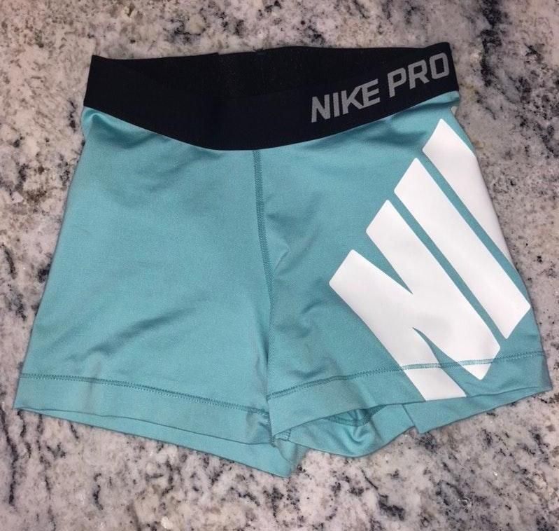 teal nike pros