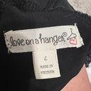 love on a hanger Tank Photo 1