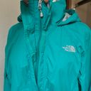 The North Face Women’s  Teal Green Raincoat Photo 1