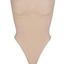 SKIMS NEW  SEAMLESS SCULPT STRAPLESS THONG BODYSUIT MICA Size M Photo 0