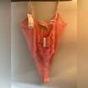 Urban Outfitters bold pink lace bodysuit NWT size Large Photo 4