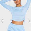 Pretty Little Thing  BLUE RUCHE LONG SLEEVE CROP Photo 0