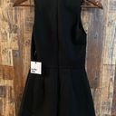 by the way. NWT black romper Low neck size XS Photo 3