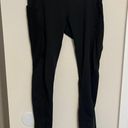 Gymshark black leggings with mesh down sides and pockets Photo 0