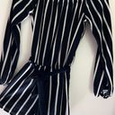 Forever 21 Navy and White Striped Off The Shoulder Long Sleeve Romper Photo 1