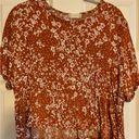 Altar'd State Altar’d State Orange and White Flower Peplum Top Photo 0