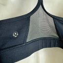 Lululemon  black flow y sports bra fits like small/medium Photo 3