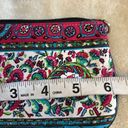 PINK AND BLUE FLORAL DESIGN WRISTLET WITH SOME BEADS ON ONE SIDE AND BLACK STRAP Photo 3