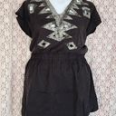 Sugar Lips  black snakeskin print cut out fit and flair dress

Size large  Photo 0