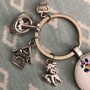 Puppy Keychain NWOT. Paw prints, dog house, dog, name tag and food dish charms. Photo 1