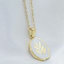 Gold Plant Irregular Shaped Pendant Necklace Photo 0