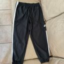 Nike Women's Sportswear Repel Essential Woven Jogger Pants Photo 6