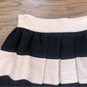 BCBGeneration  • Pleated Mini Skirt tan black stripe Dark Buff pockets full Photo 2