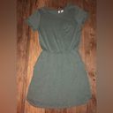 Divided  dress size xs fits up to medium with 3 pockets Photo 3