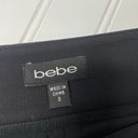 Bebe  Women’s Black Adjustable Waist Pencil Midi Skirt Size 0 Photo 5