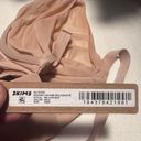 SKIMS - No Show Unlined Balconette Bra Photo 2