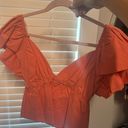 Boutique Orange Top Photo 1